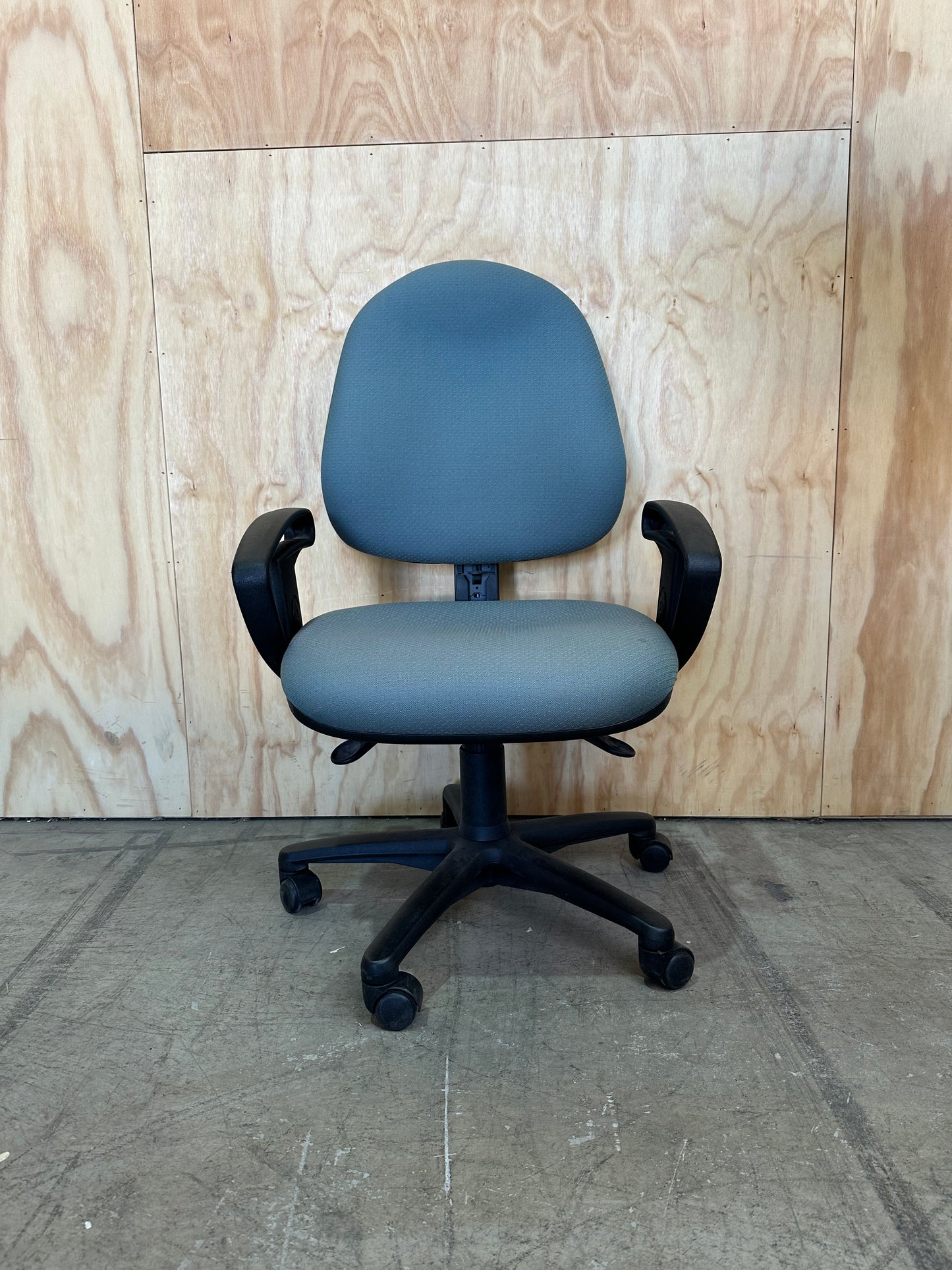 Green fabric covered office chair