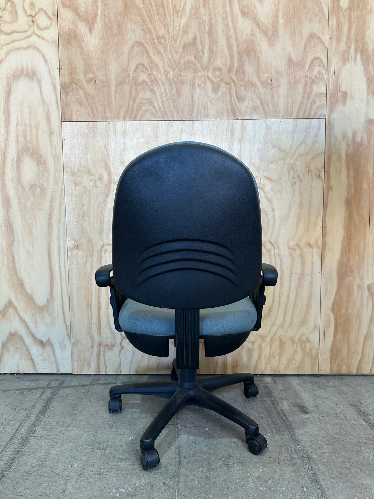 Green fabric covered office chair