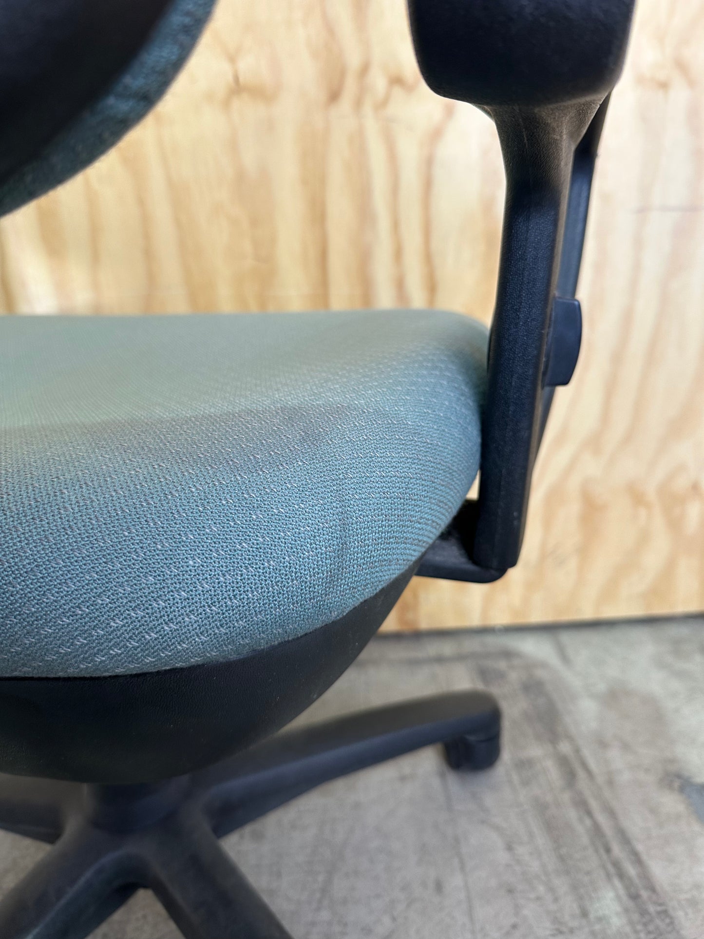 Green fabric covered office chair
