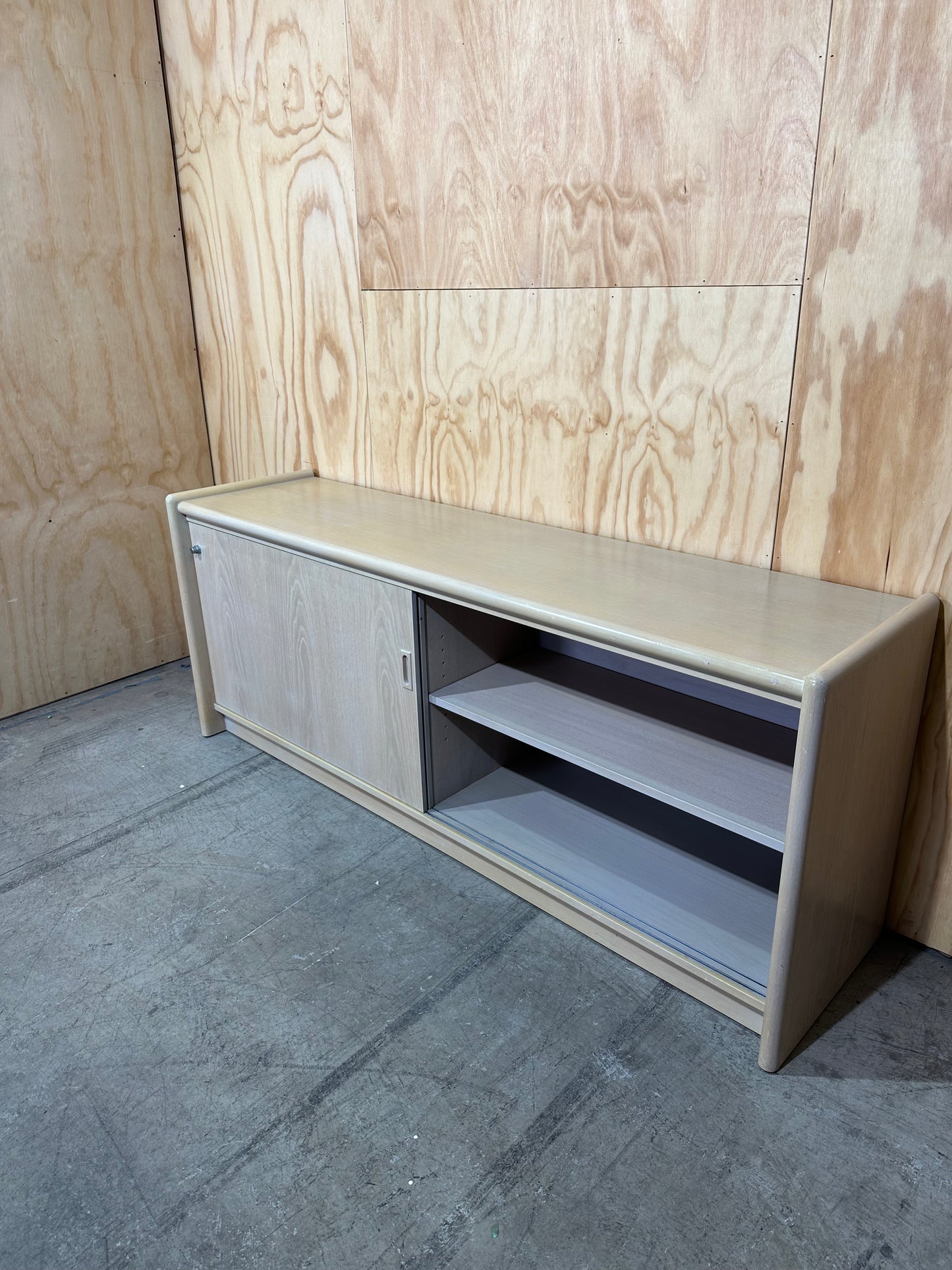 Wood veneer credenza with sliding doors