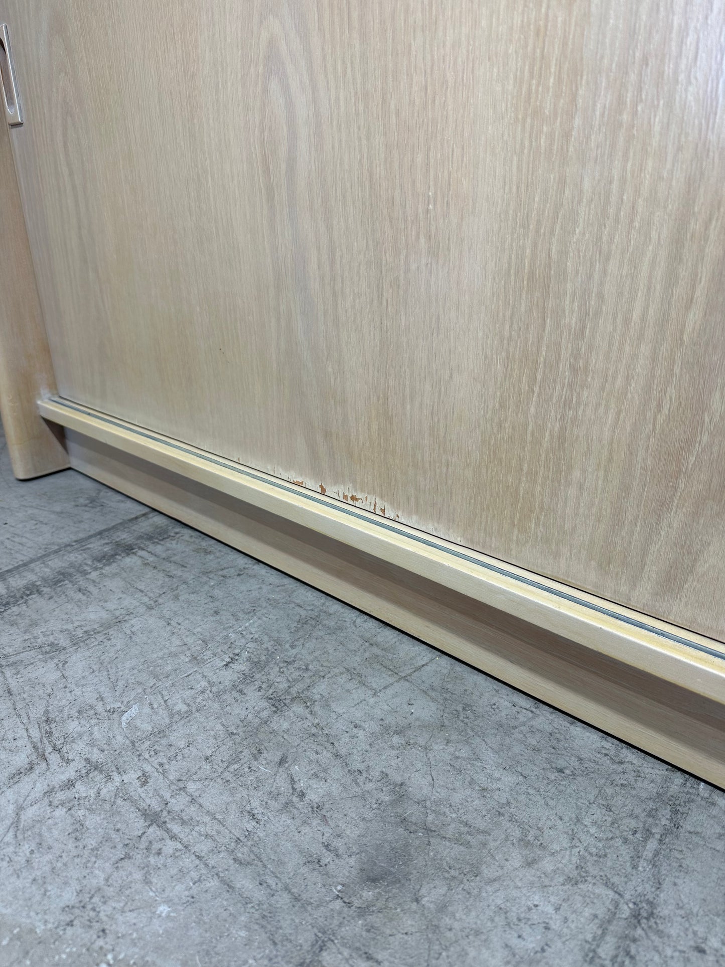 Wood veneer credenza with sliding doors