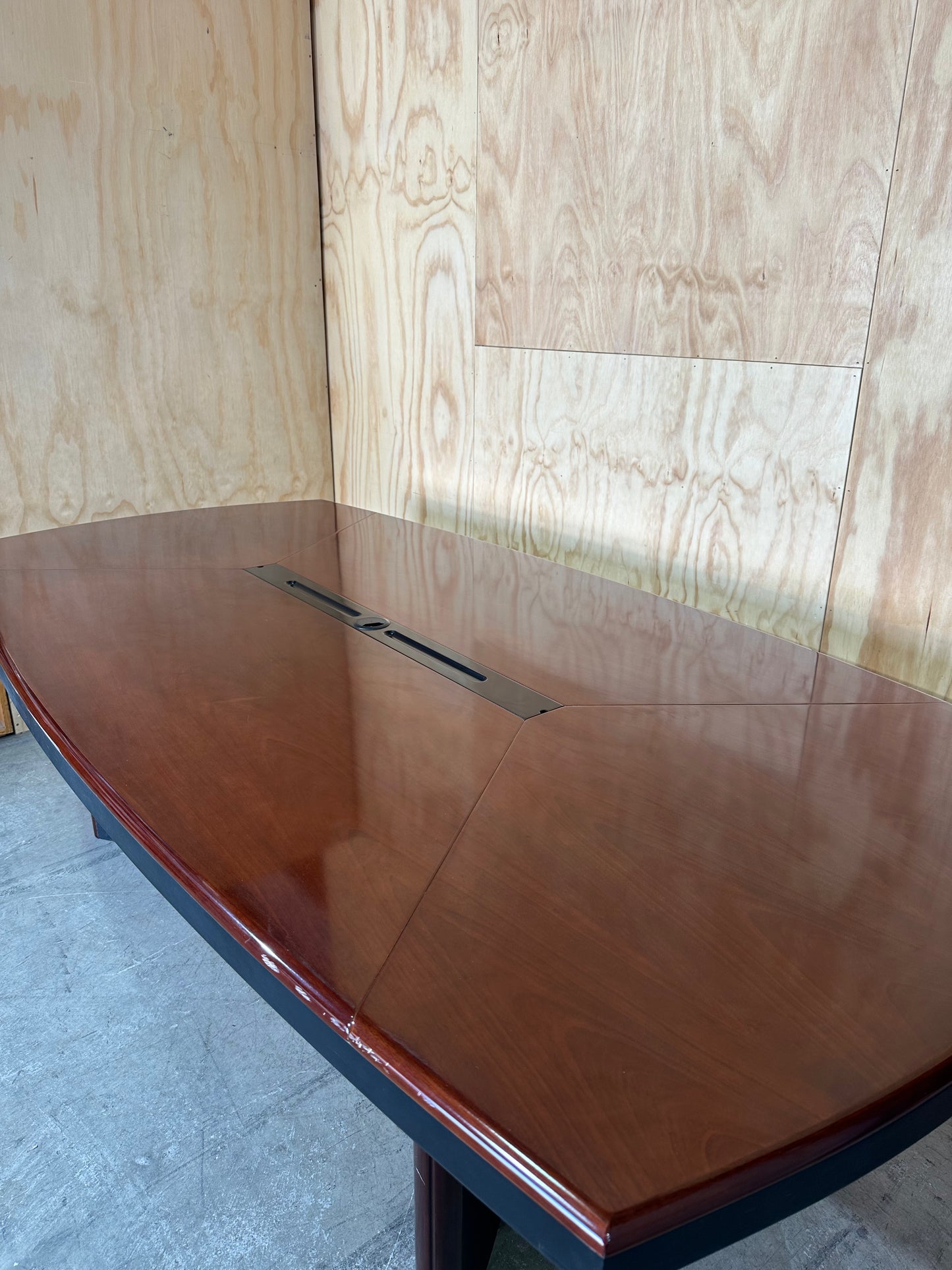 Polished timber veneer meeting table with cable management