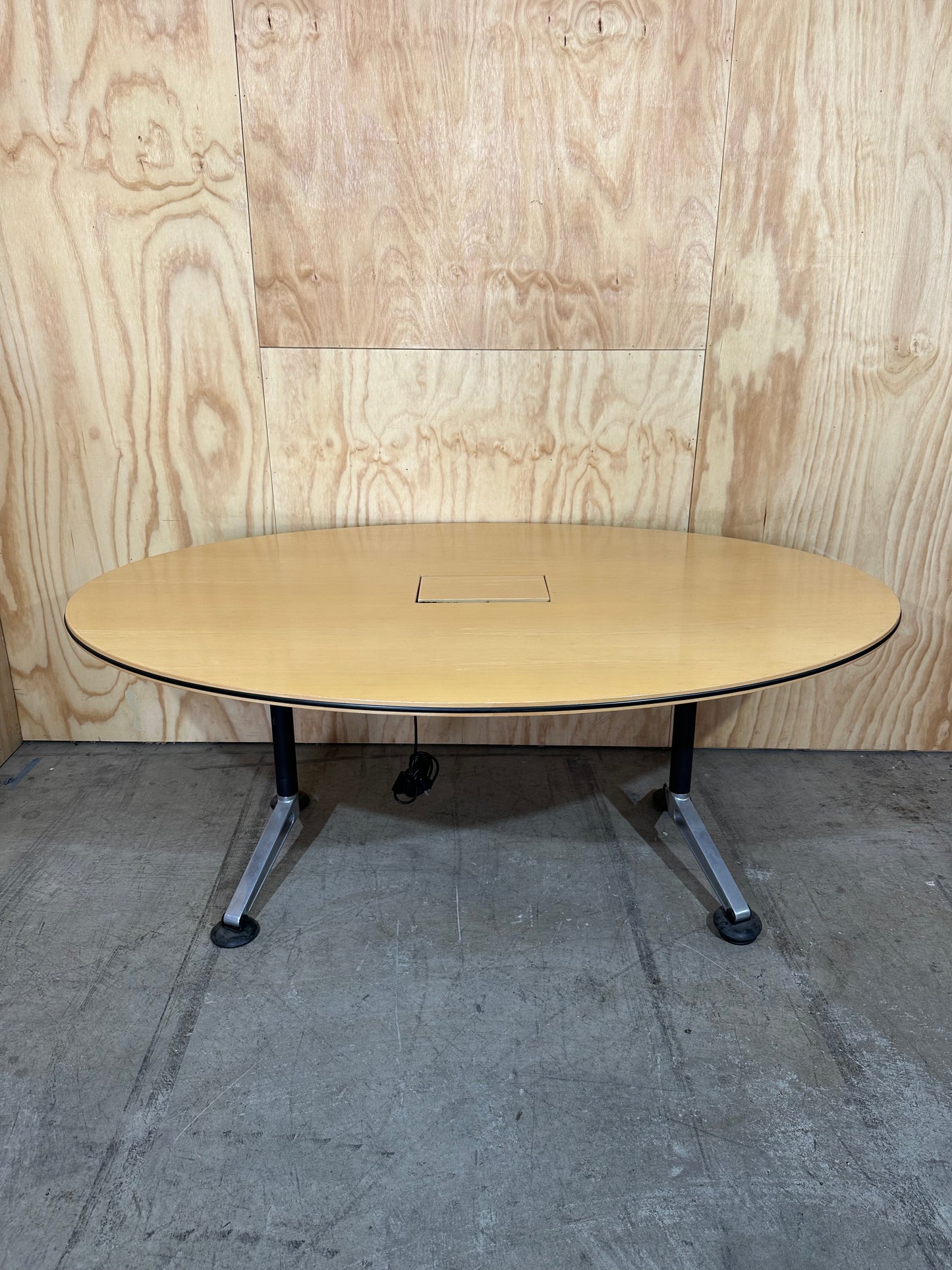 Wilkhahn oval tabletop on Chrome Thinkingworks legs with powerbox