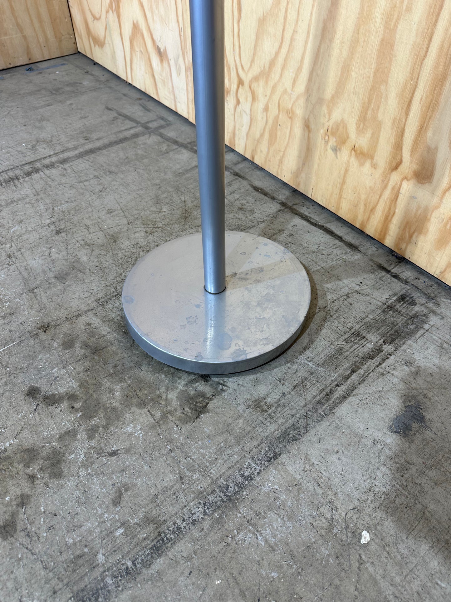 Grey coat rack on chrome base