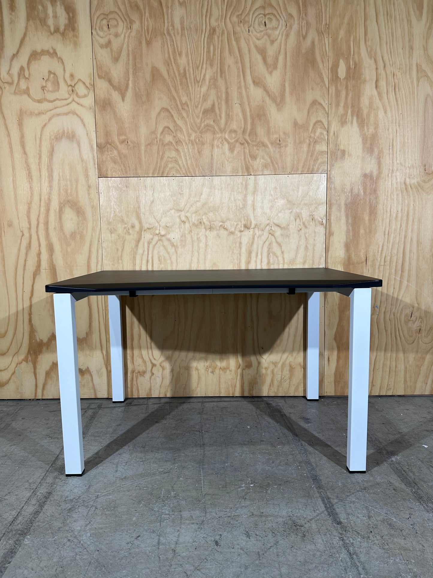 Black desk with curved edge