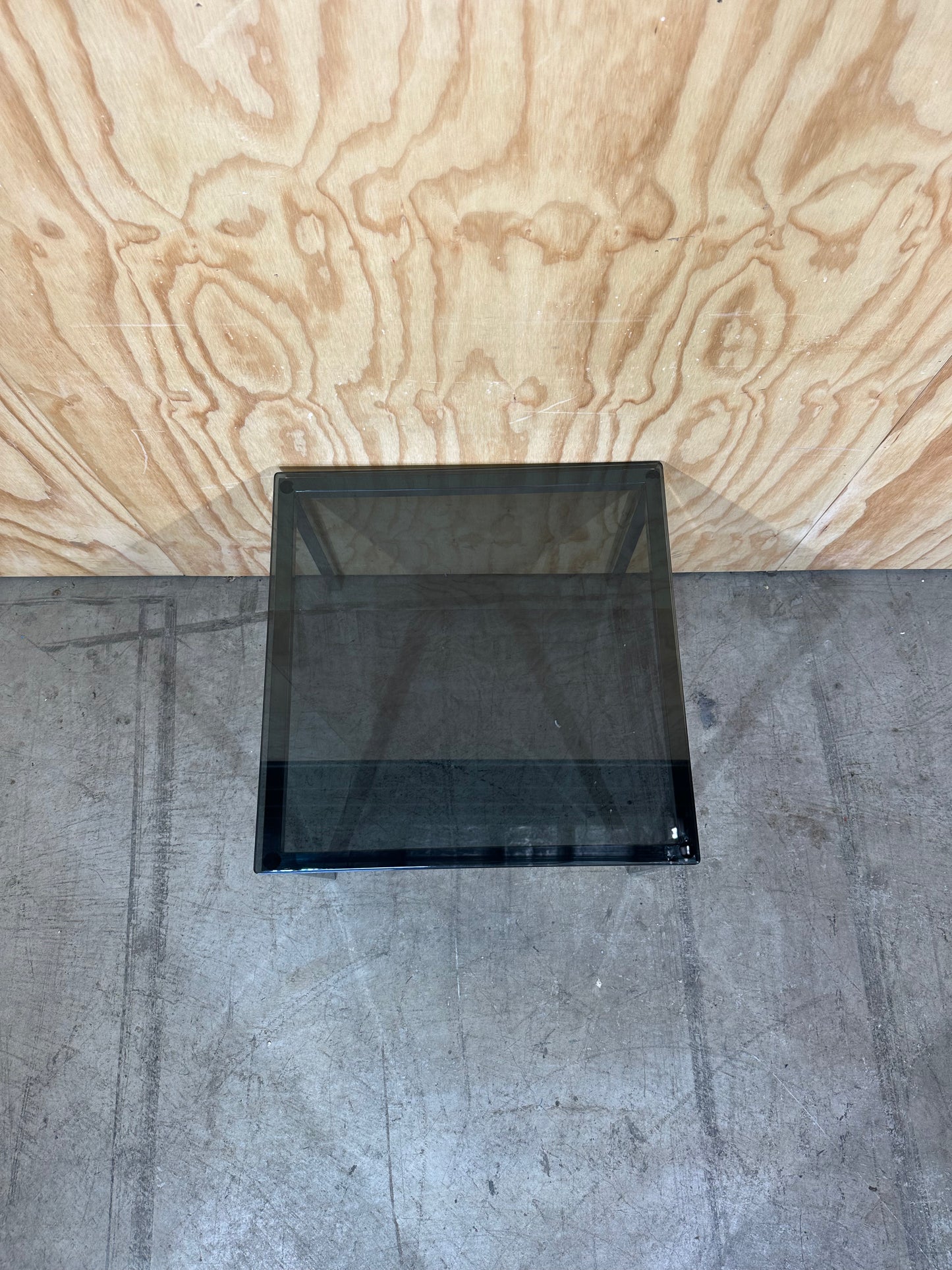 Square smoked glass coffee table on chrome base