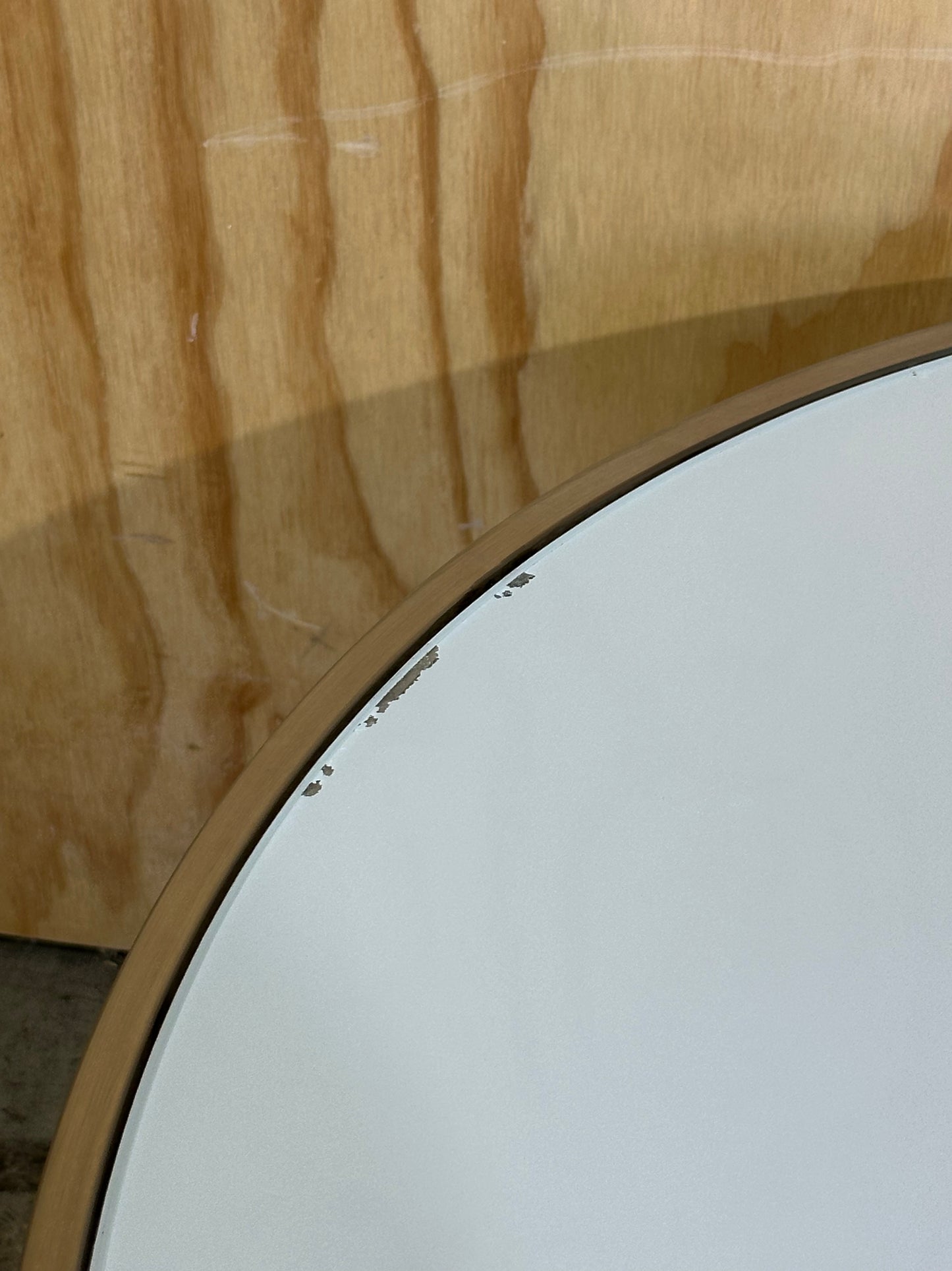 White glass coffee table on circular chrome base