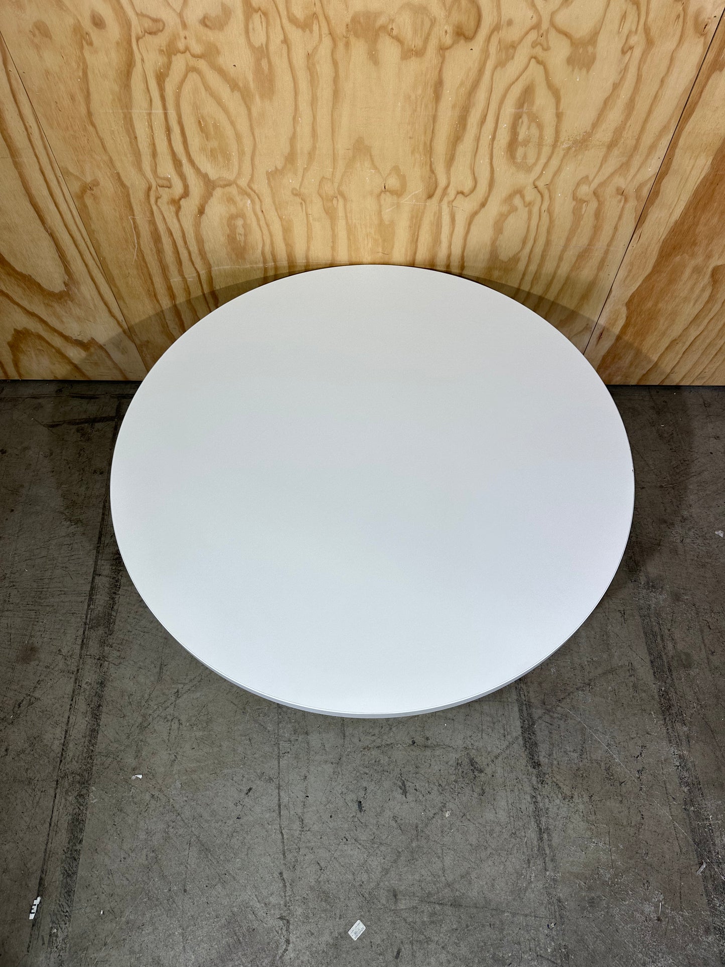 White coffee table on chrome base