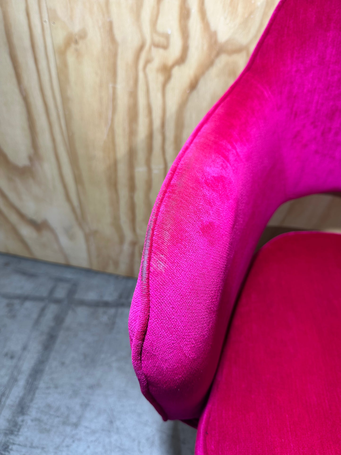 Hot pink velvet armchair on timber legs
