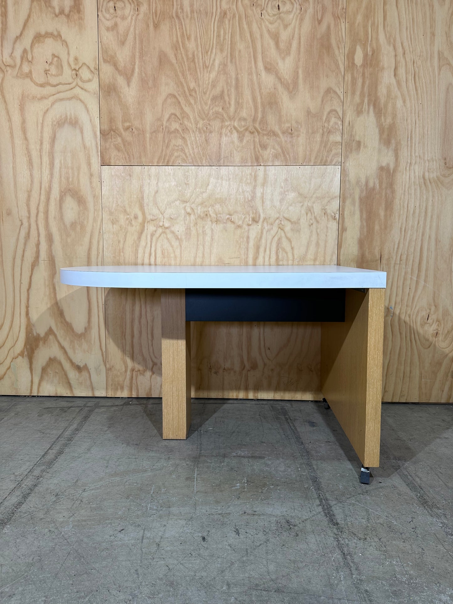 White wall mounted desk on timber legs & castors