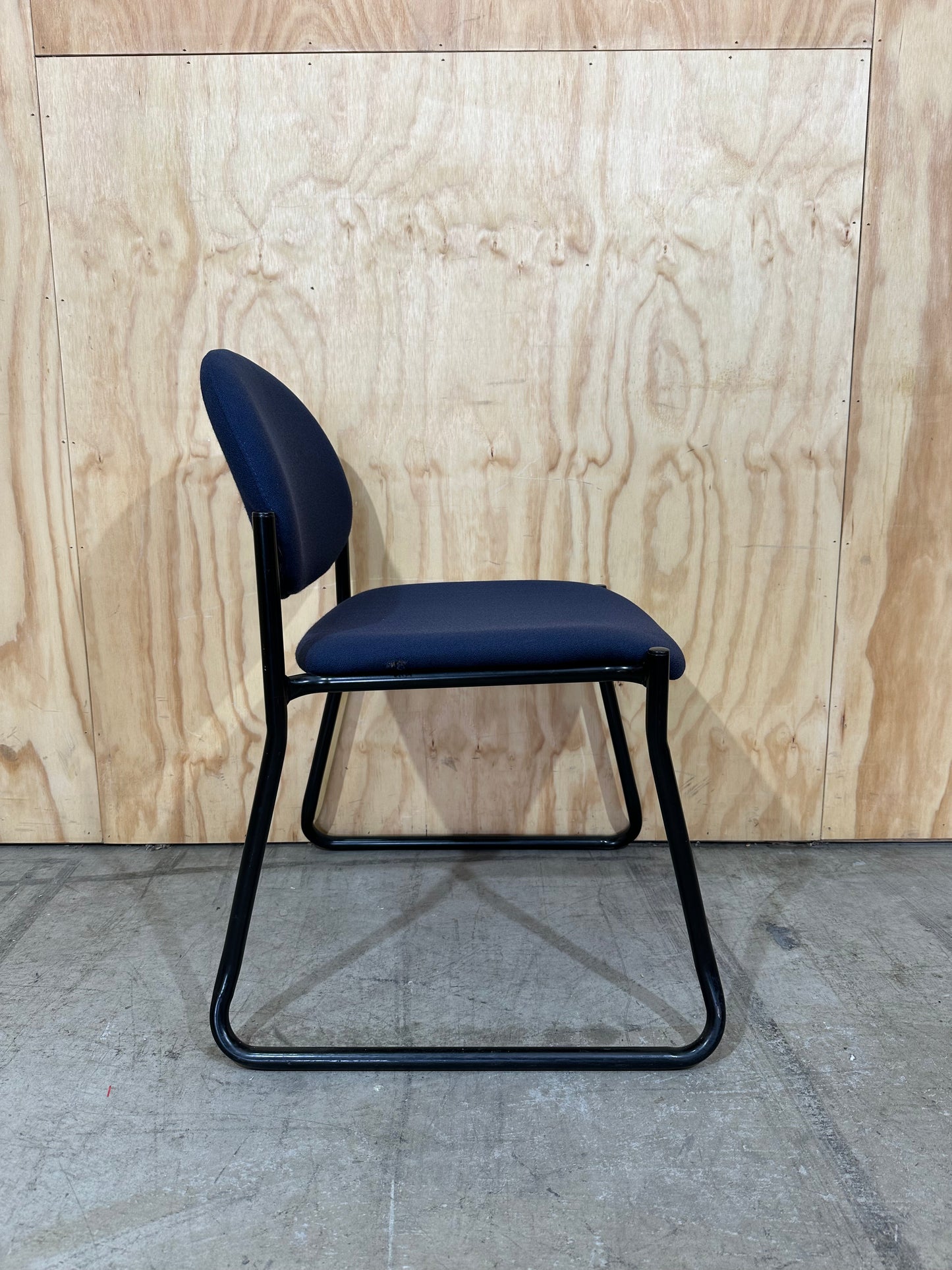 Upholstered blue visitor sled chair