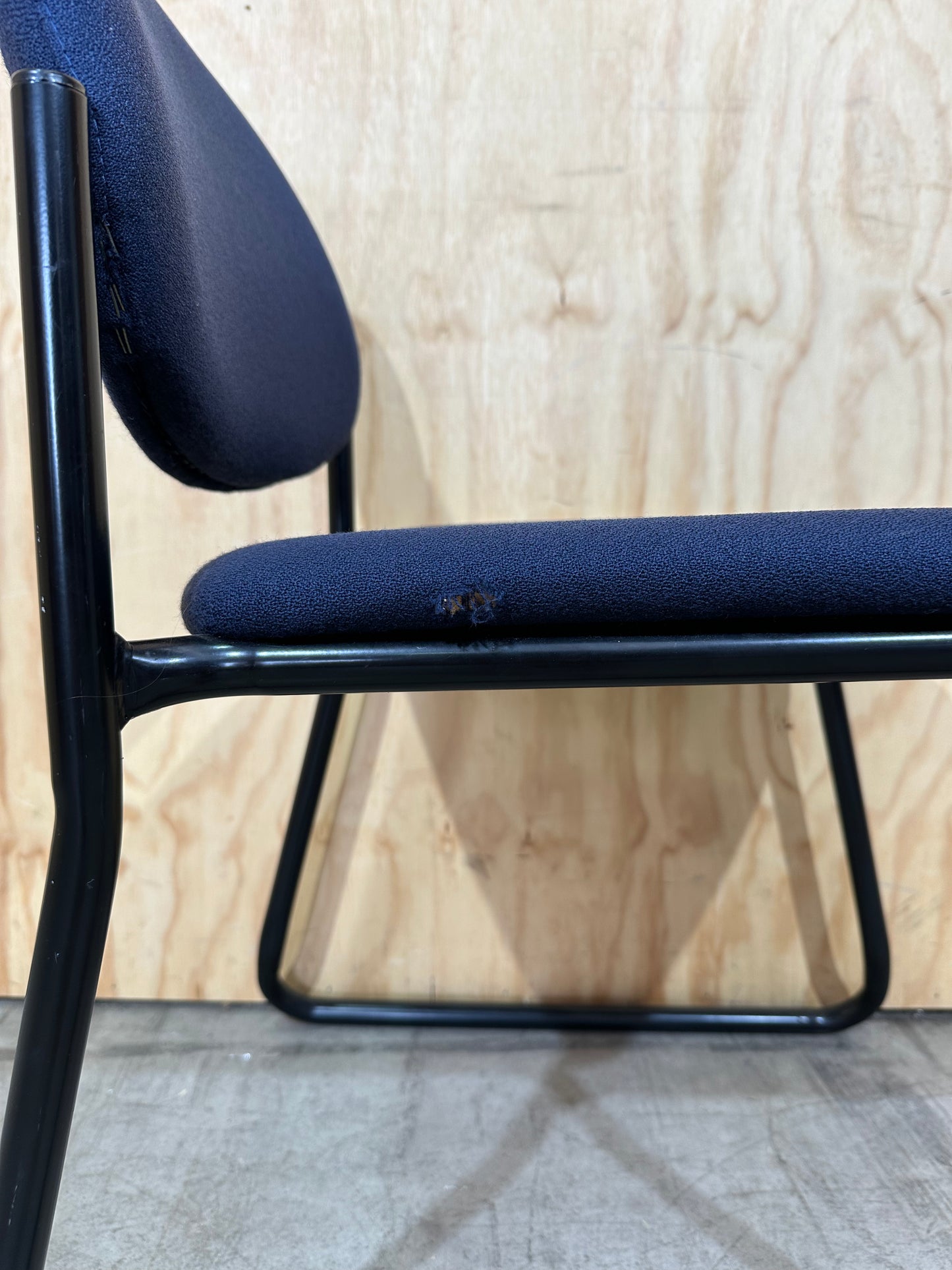 Upholstered blue visitor sled chair