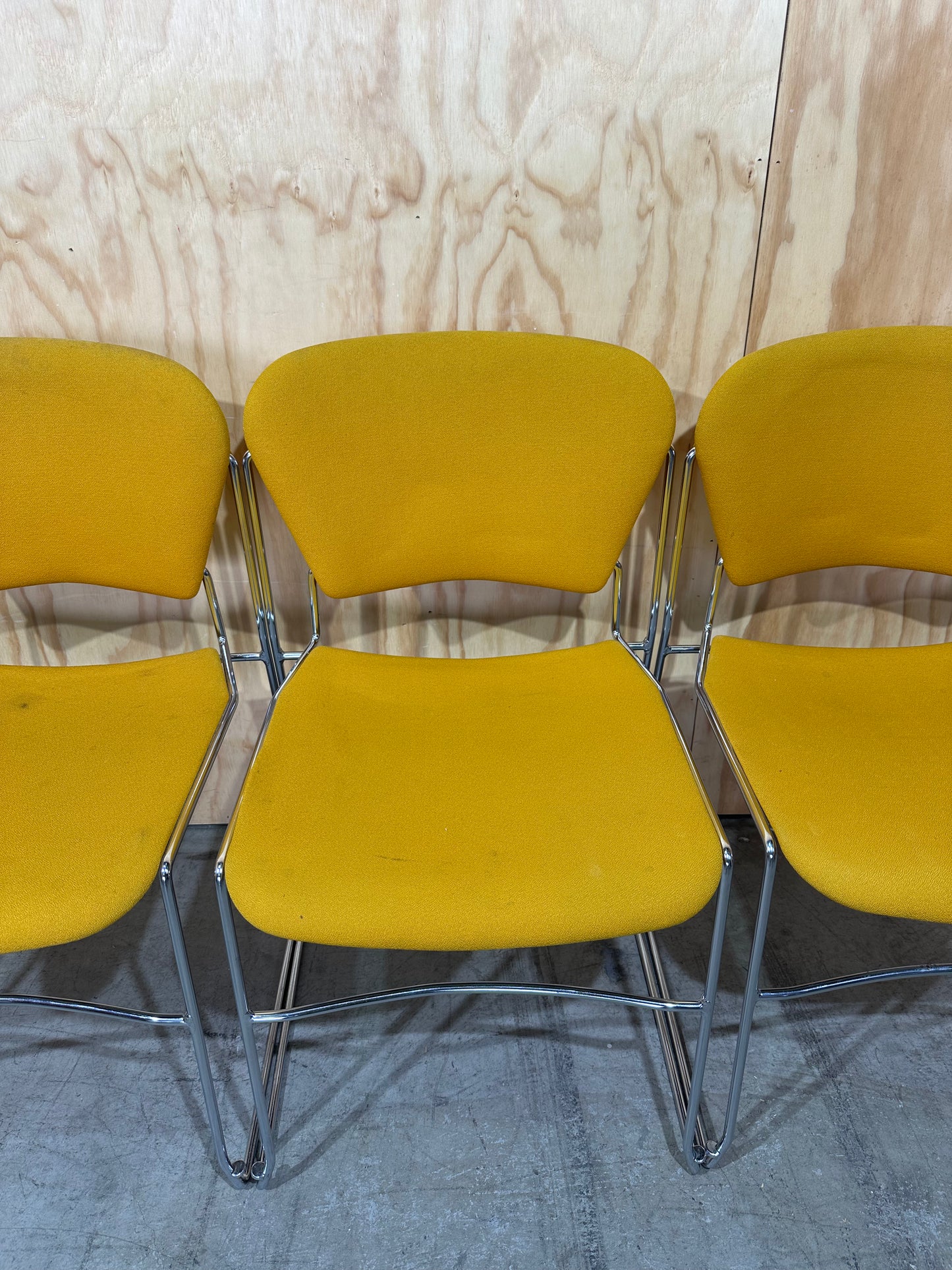 Set of 4 Stem Matrix fabric chairs on chrome frame in yellow