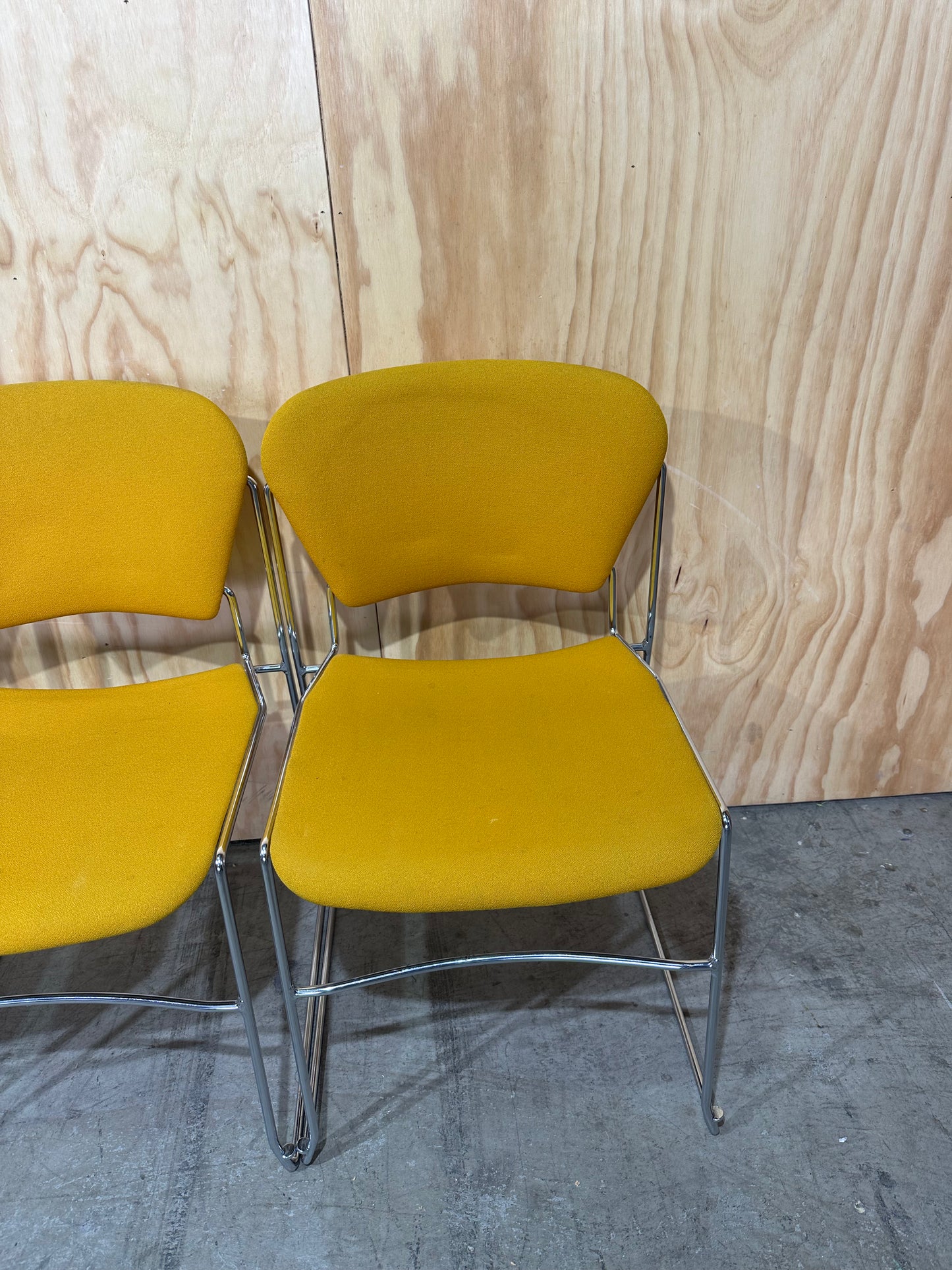 Set of 4 Stem Matrix fabric chairs on chrome frame in yellow