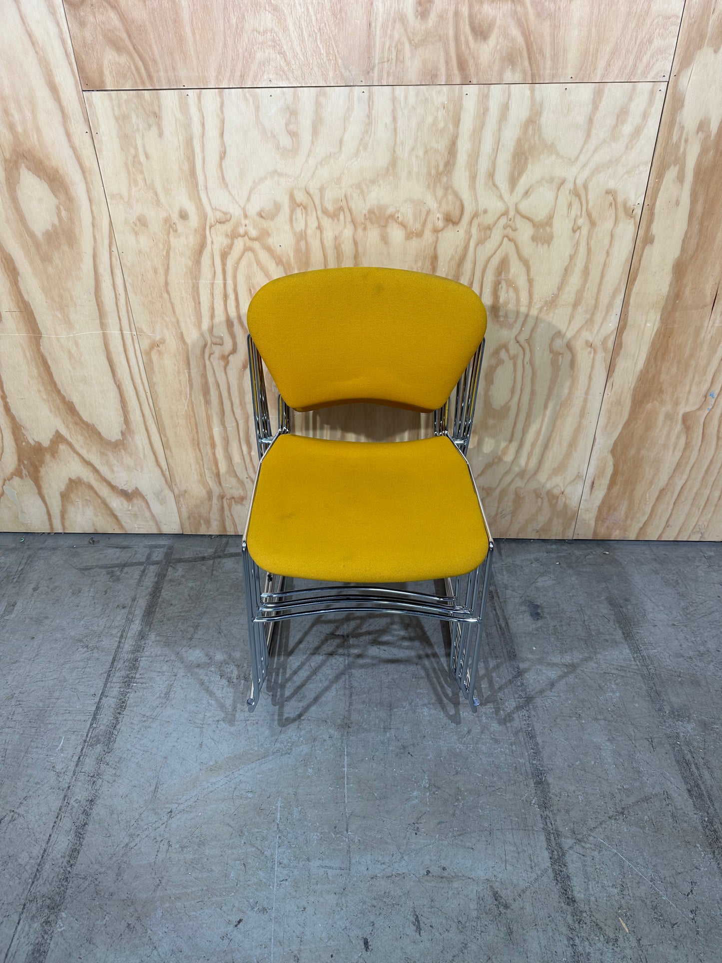 Set of 4 Stem Matrix fabric chairs on chrome frame in yellow