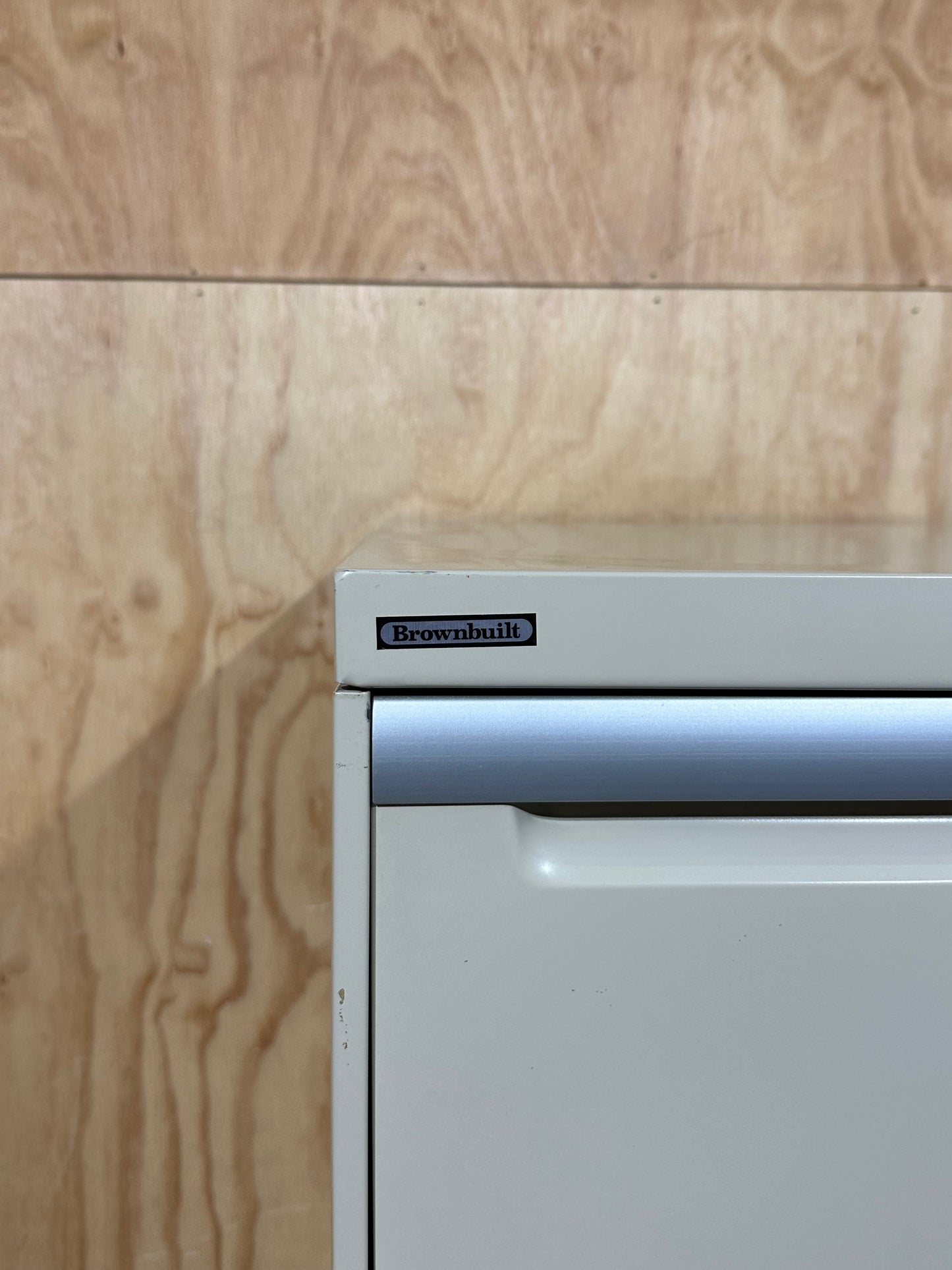 Three drawer filing cabinet in beige