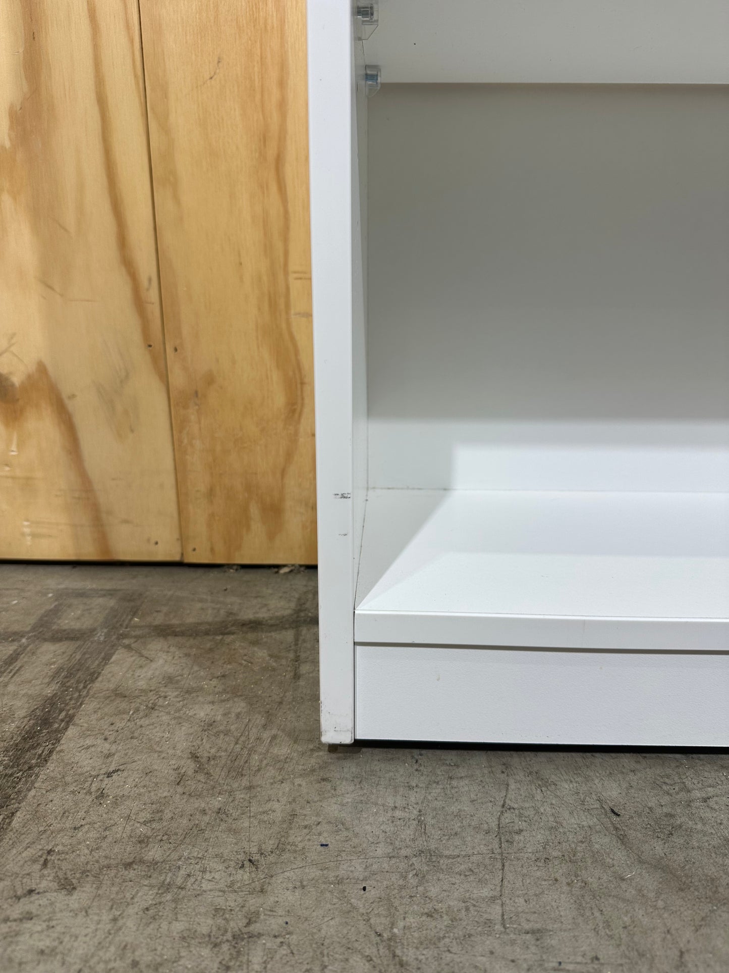 Wide white bookcase with timber top