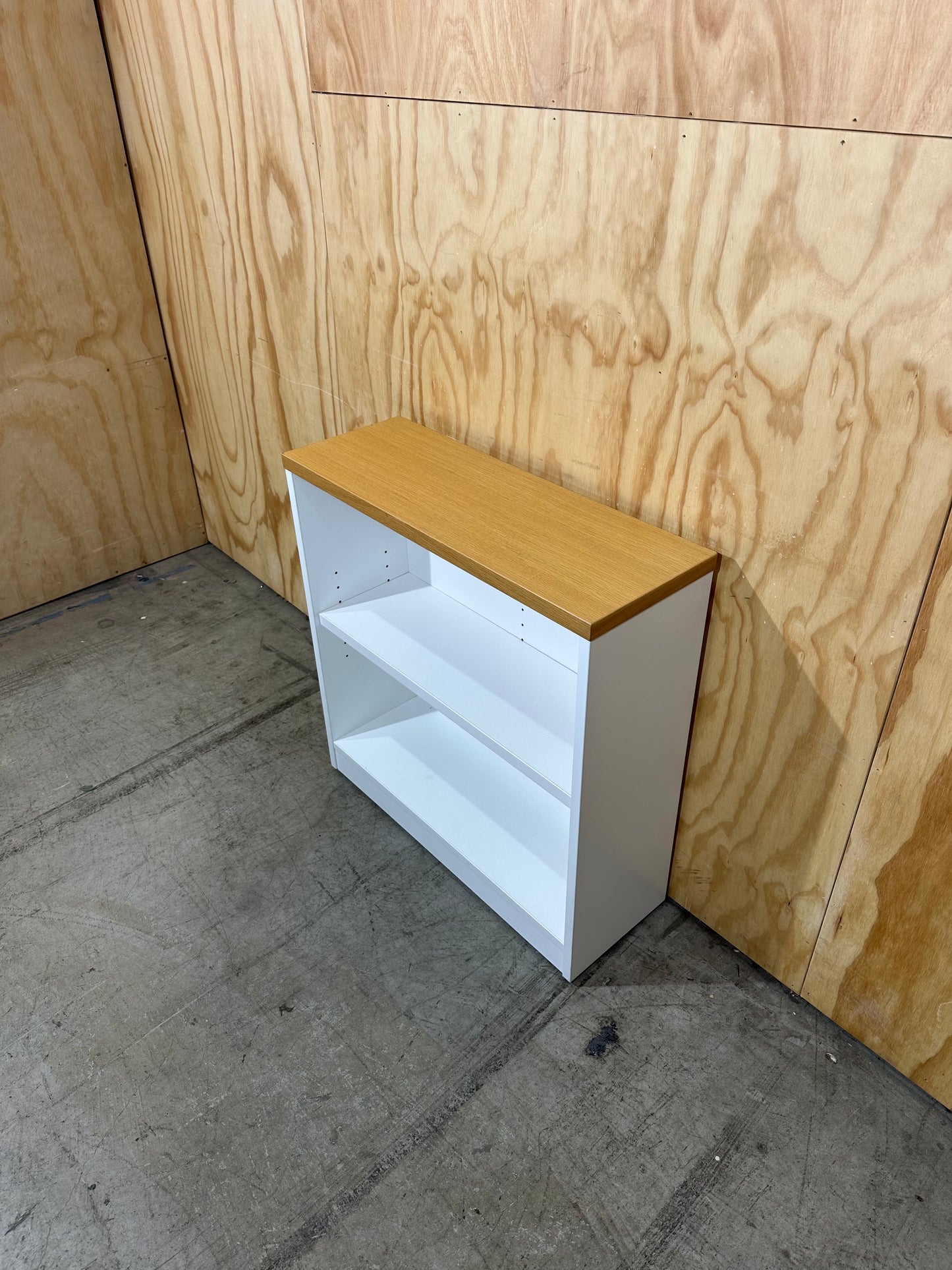 White bookcase with timber top