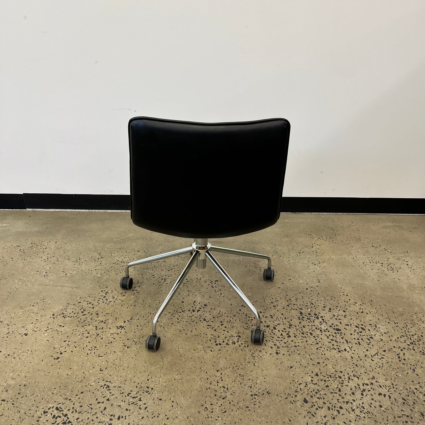 Chino Leather-Look Black Swivel Chair on Castors