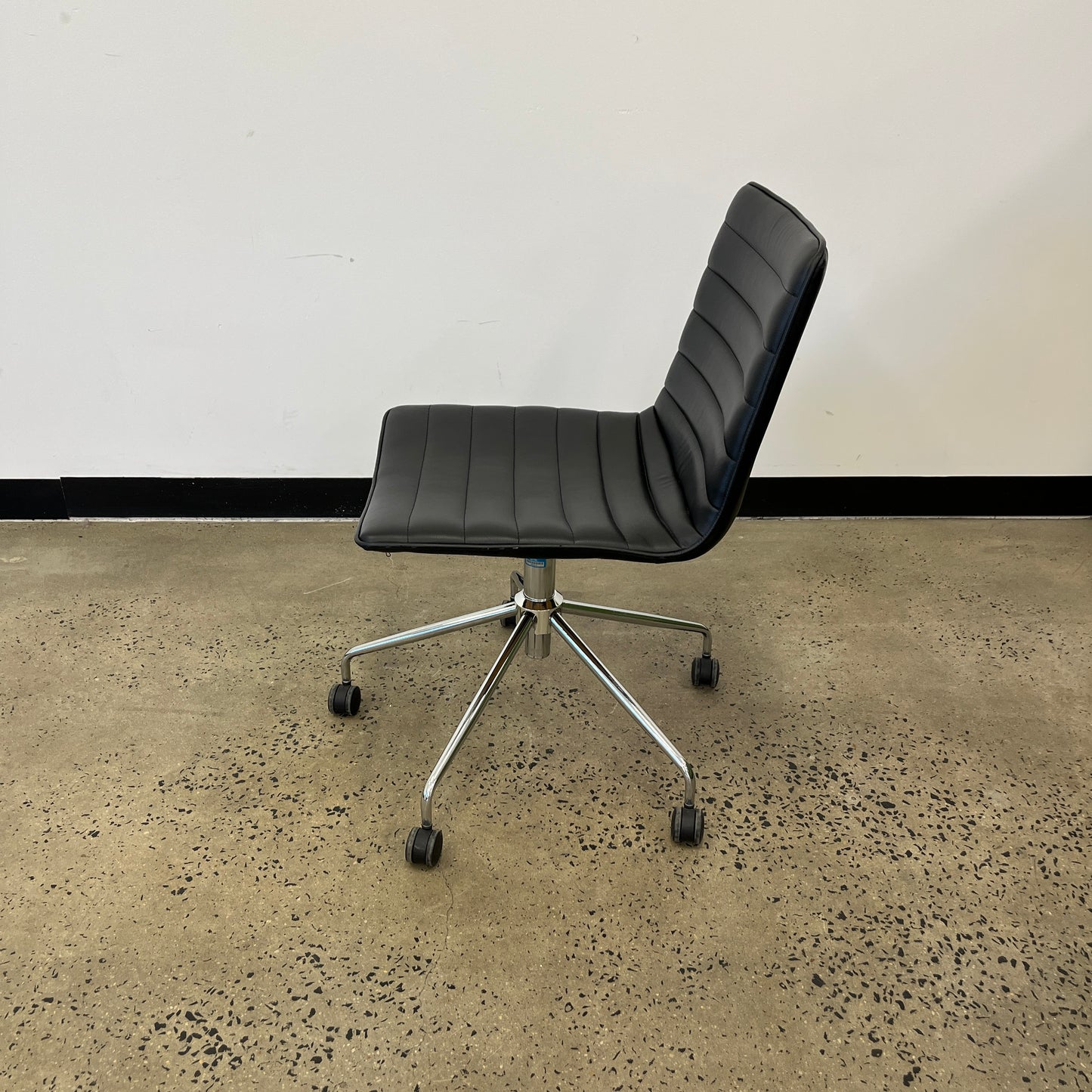 Chino Leather-Look Black Swivel Chair on Castors