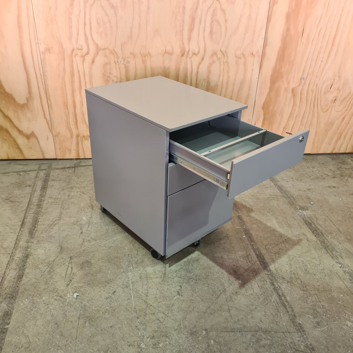 Grey Metal Pedestal on Wheels