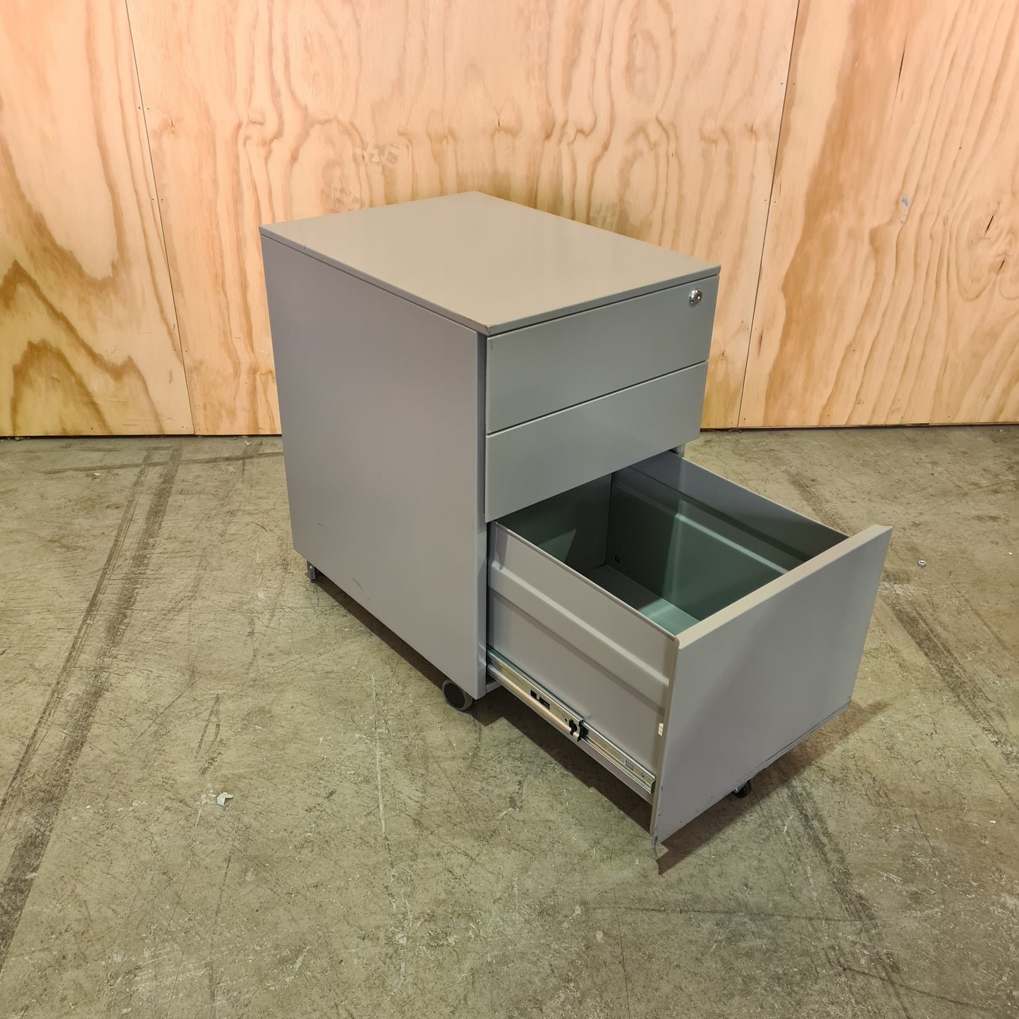 Grey Metal Pedestal on Wheels