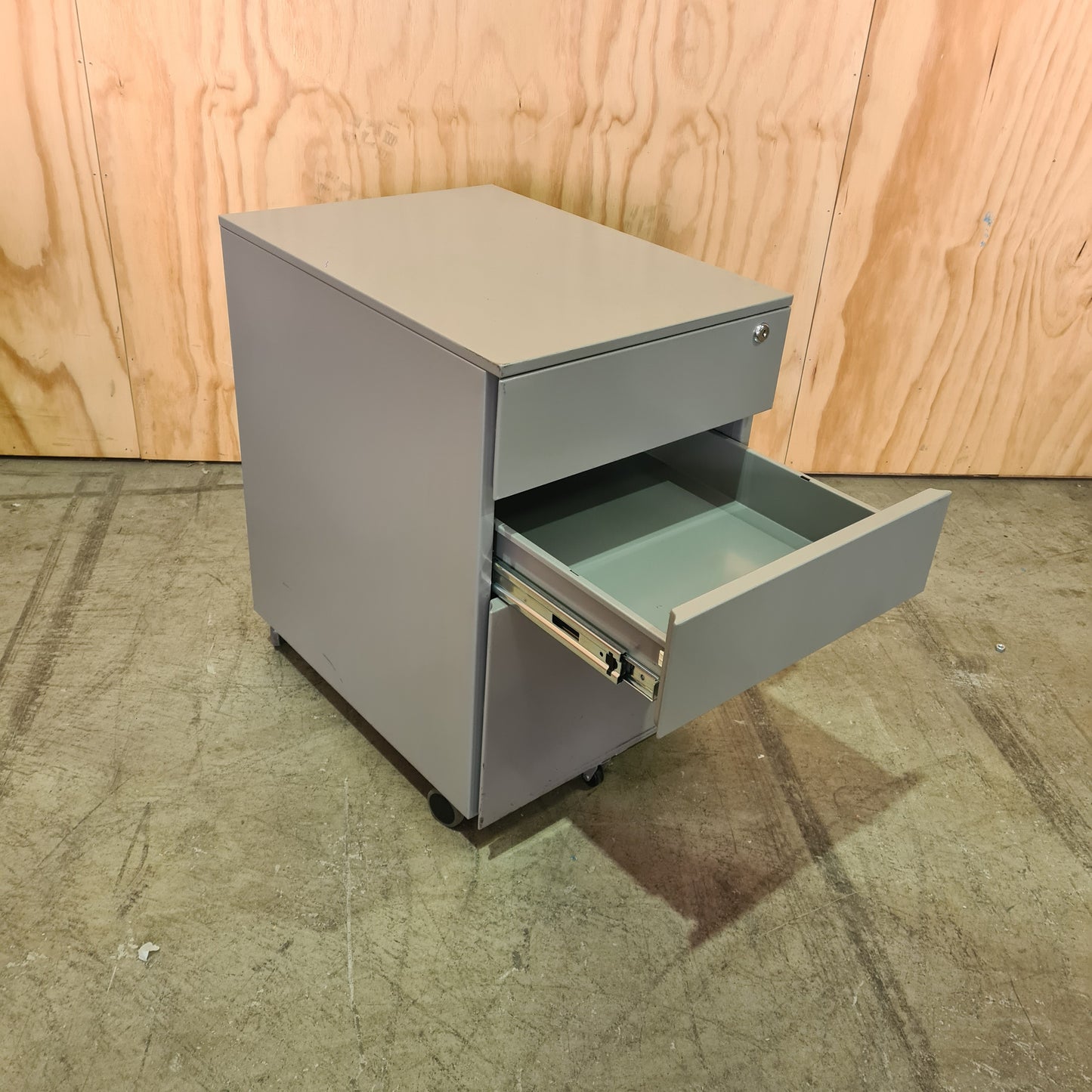 Grey Metal Pedestal on Wheels