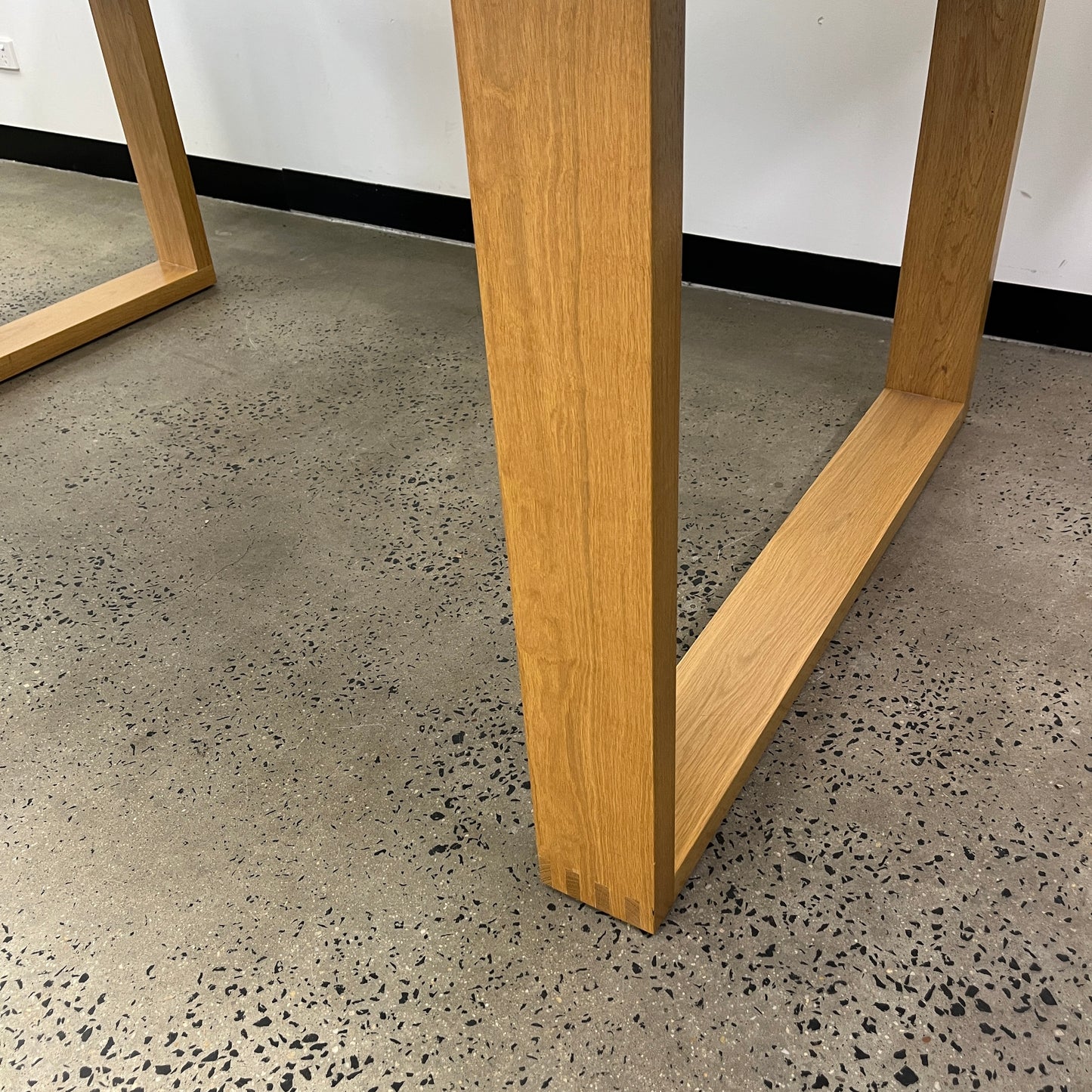 White Standing Desk with Stirrup Wooden Legs