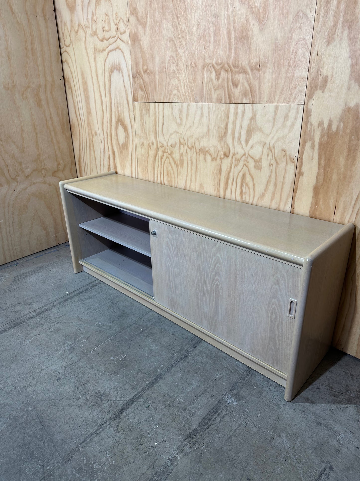 Wood veneer credenza with sliding doors