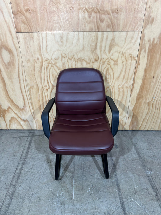 Maroon leather boardroom sled chair with arms
