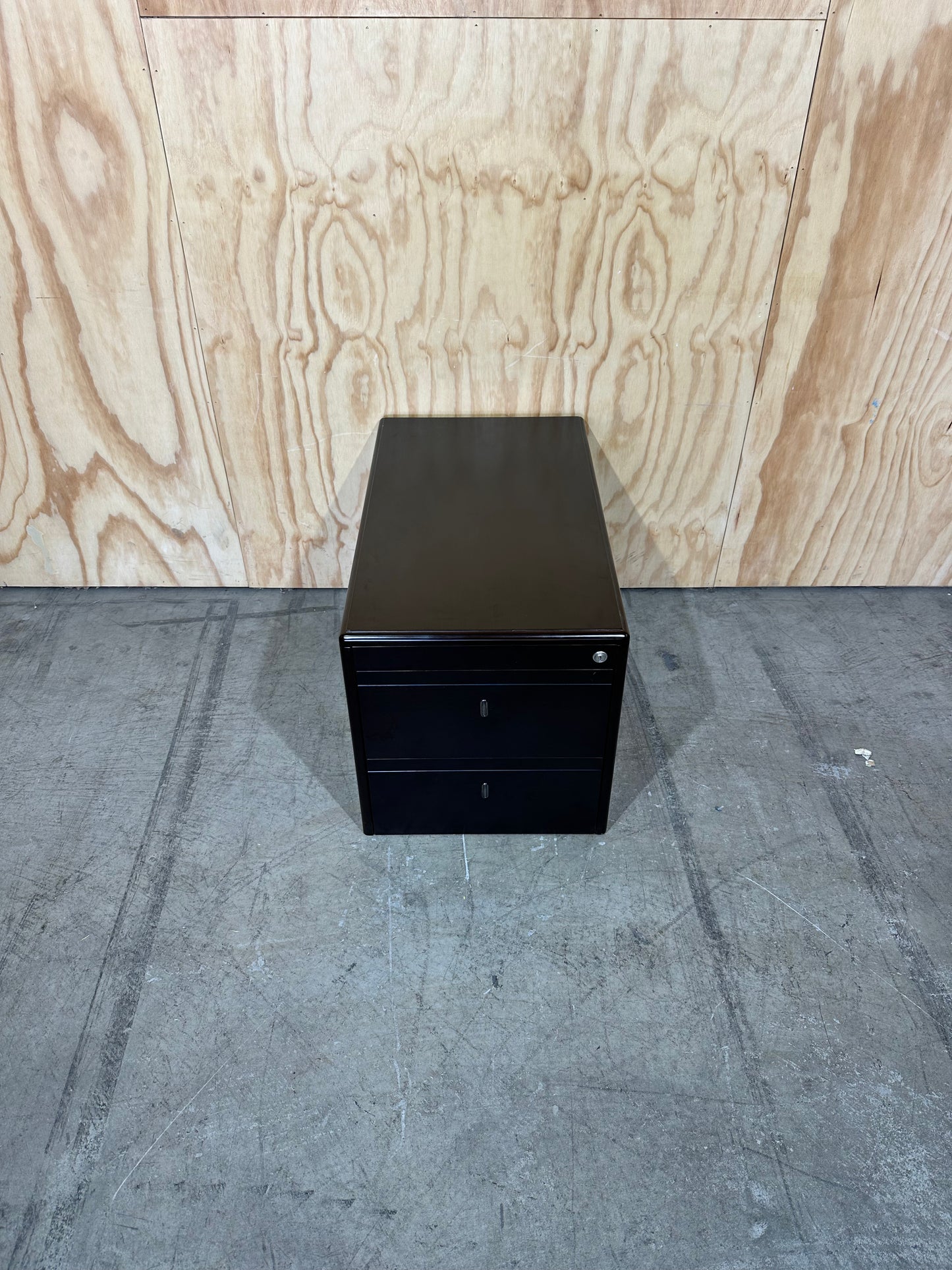 Dark wood veneer pedestal