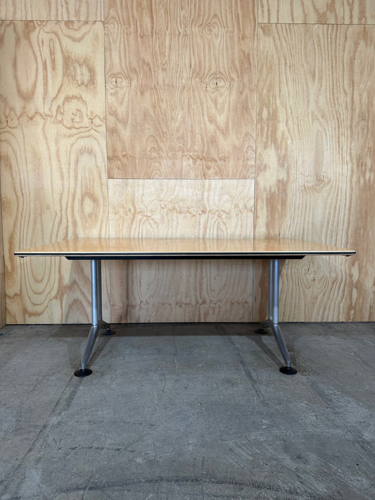 Meeting table with chrome legs and powerbox