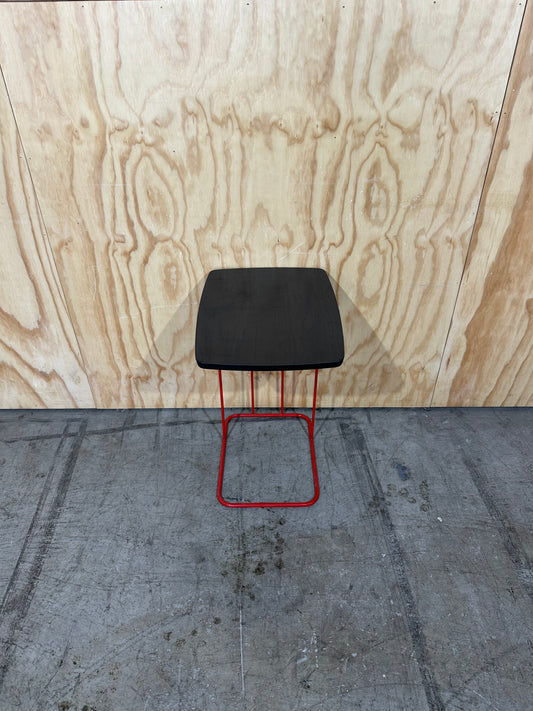 Wood magazine table with red metal base