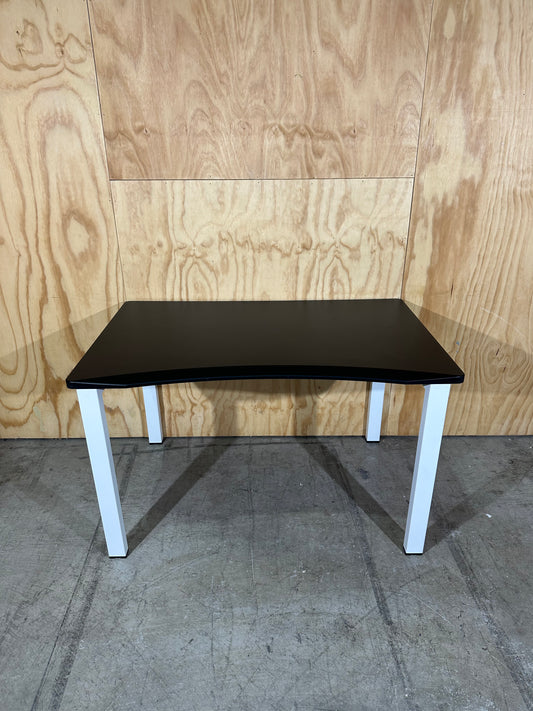Black desk with curved edge