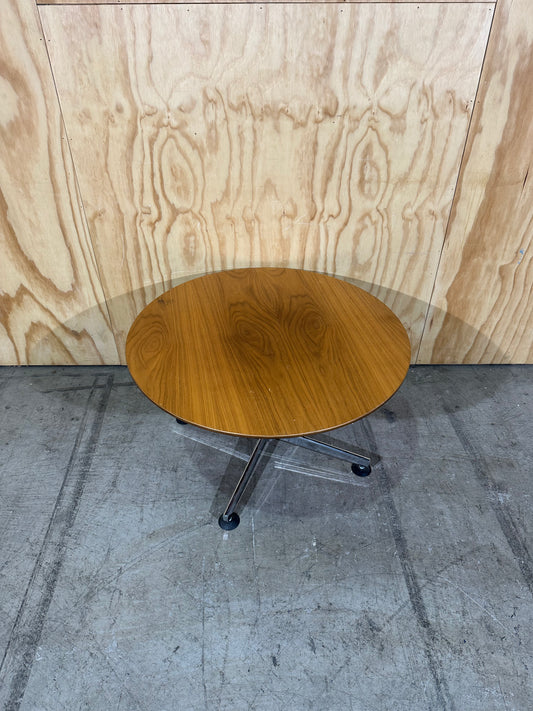 Round timber coffee table on chrome base