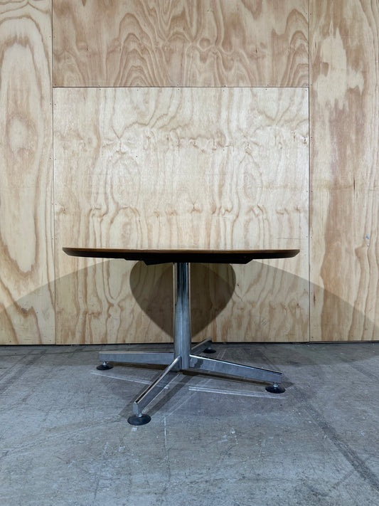 Round timber coffee table on chrome base