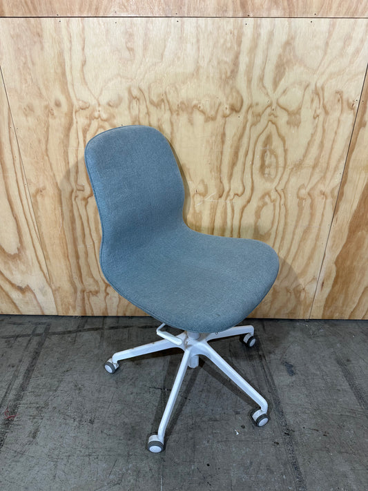 Light blue office swivel chair on castors