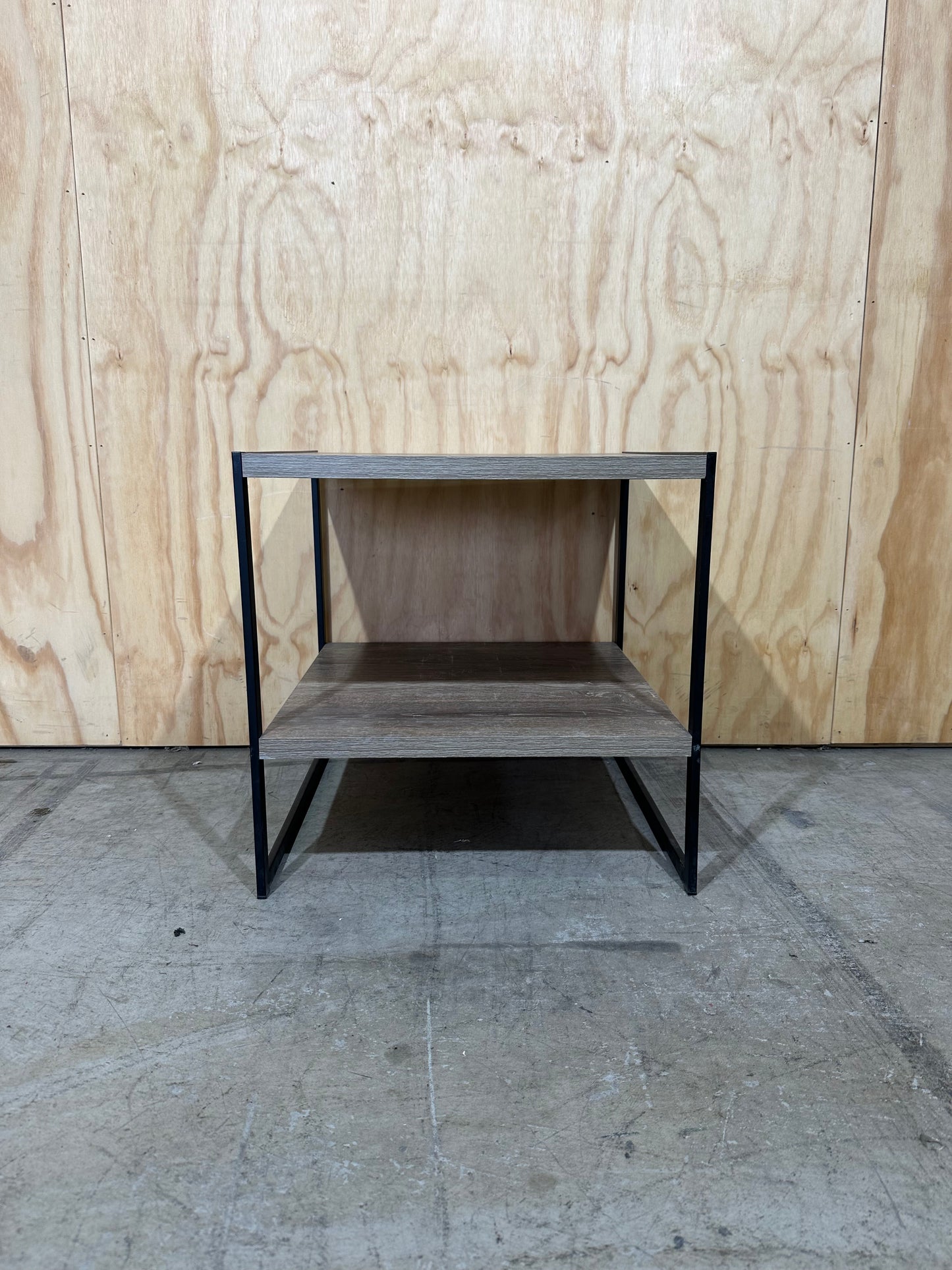 Timber laminate coffee table on black metal frame
