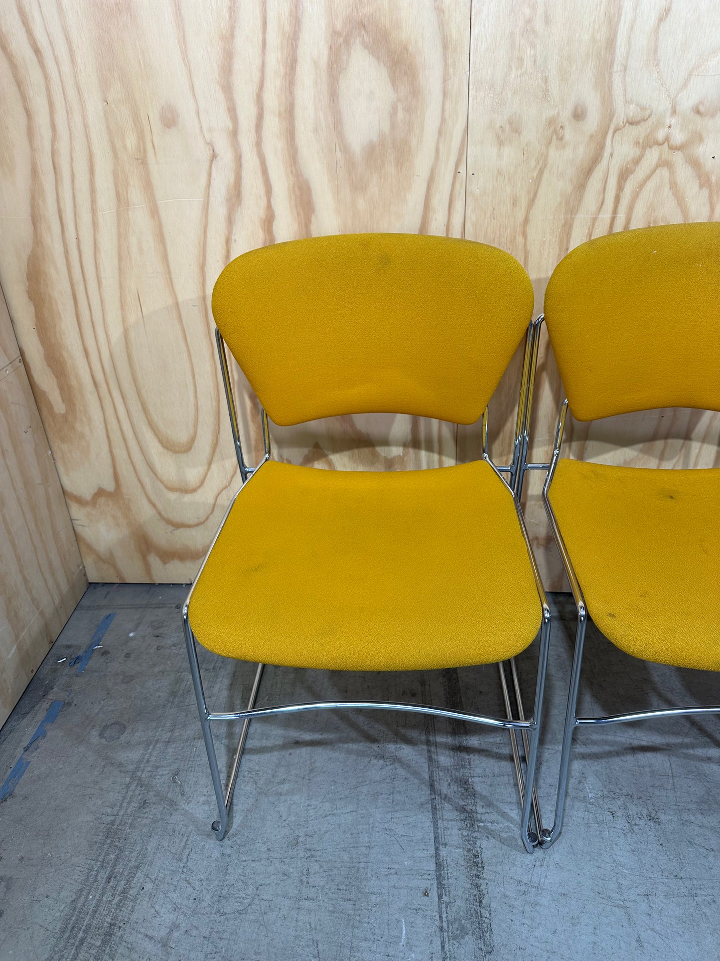 Set of 4 Stem Matrix fabric chairs on chrome frame in yellow