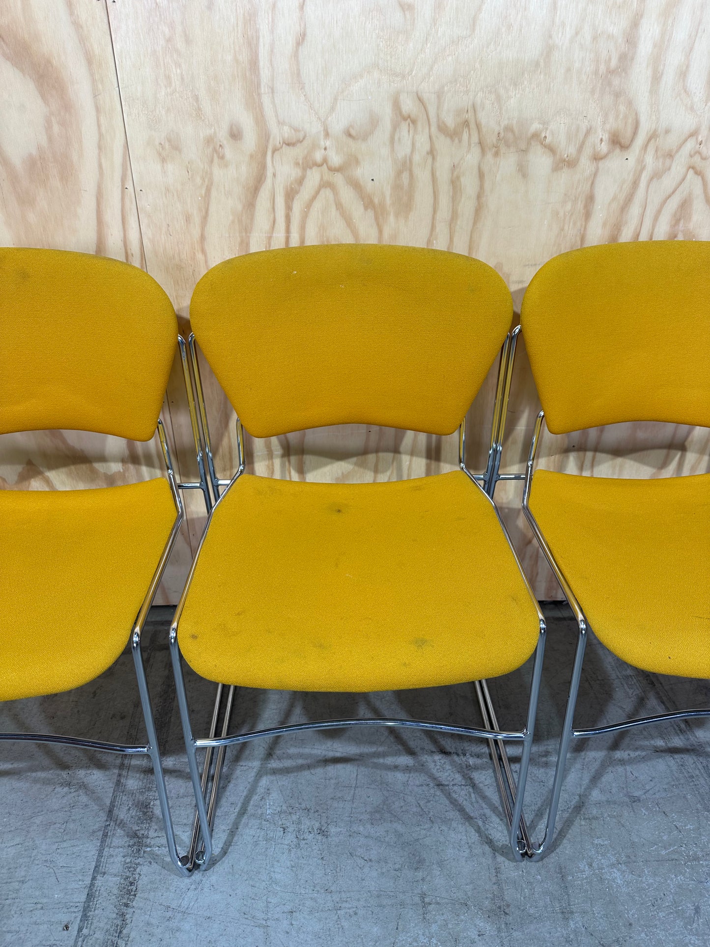 Set of 4 Stem Matrix fabric chairs on chrome frame in yellow