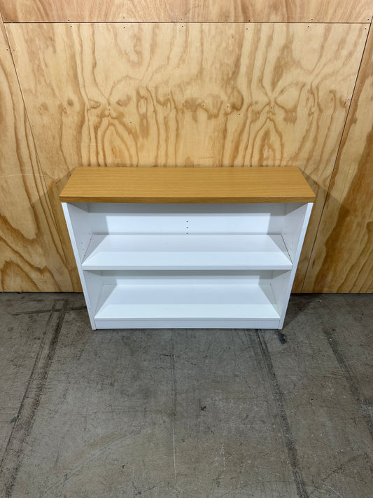Wide white bookcase with timber top