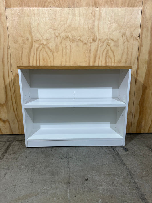 Wide white bookcase with timber top