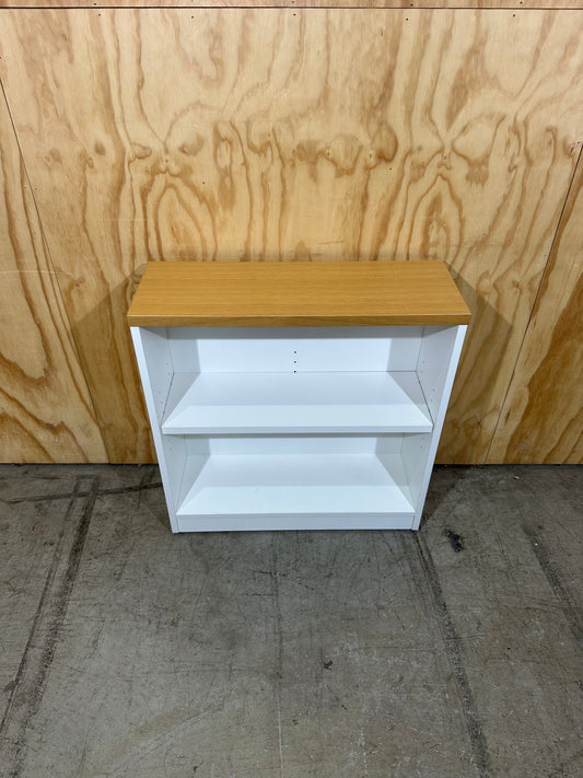 White bookcase with timber top