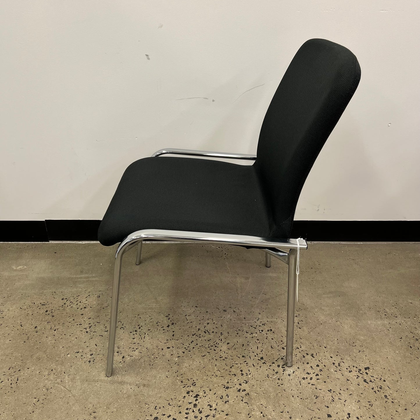 Schiavello black stackable chair with chrome legs