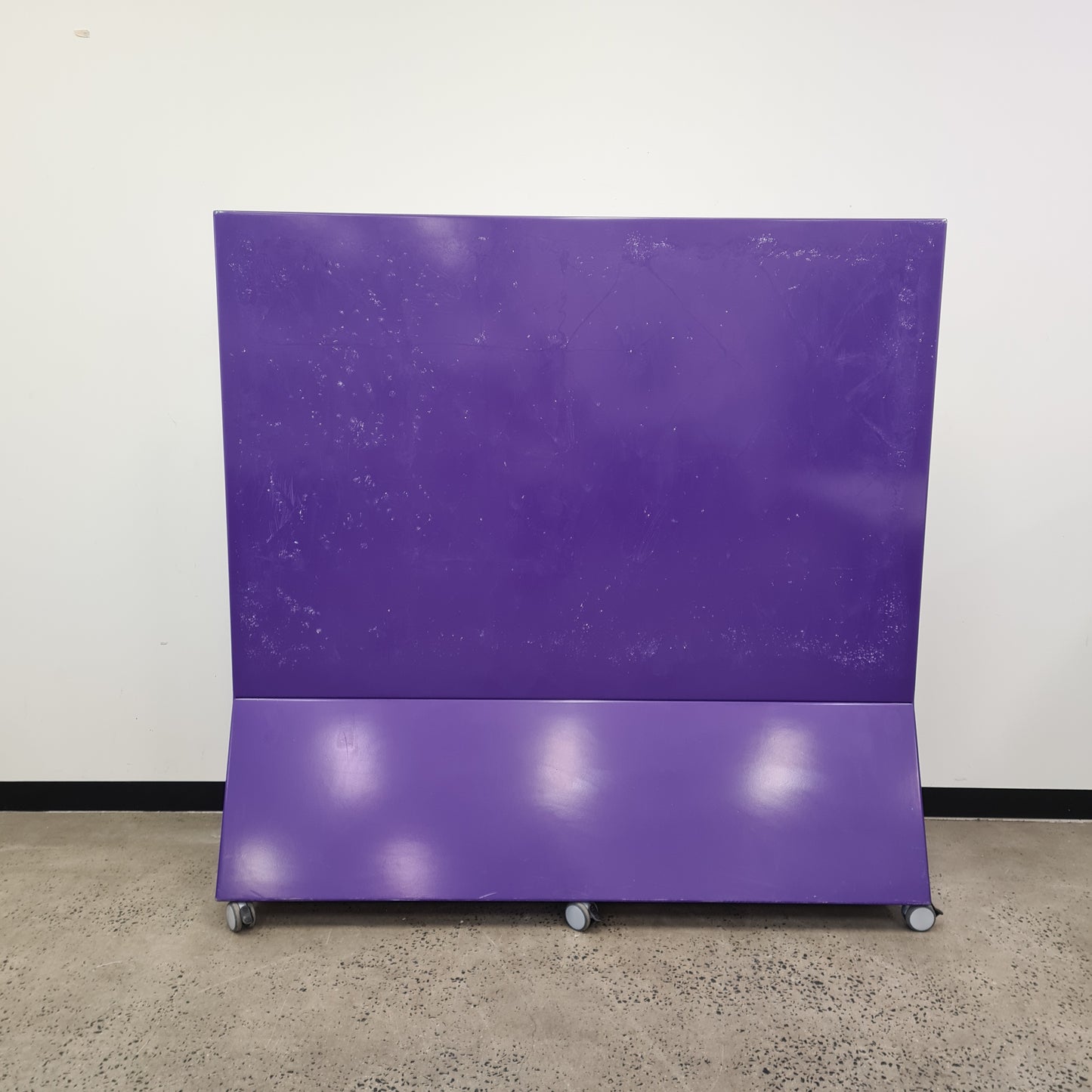 Mobile Magnetic Glass Whiteboard with Purple Metal Base on Castors