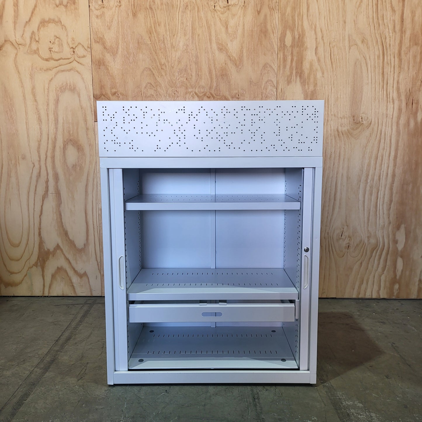 White tambour with planter